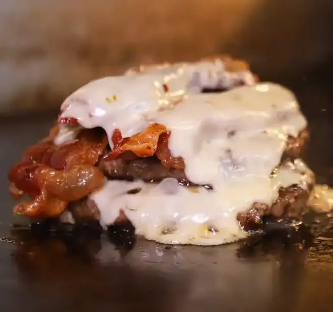 Black Burger's Mouthwatering Patty with Bacon and Cheese